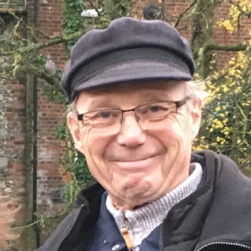 Portrait of author Robert Stevenson wearing a captain's hat